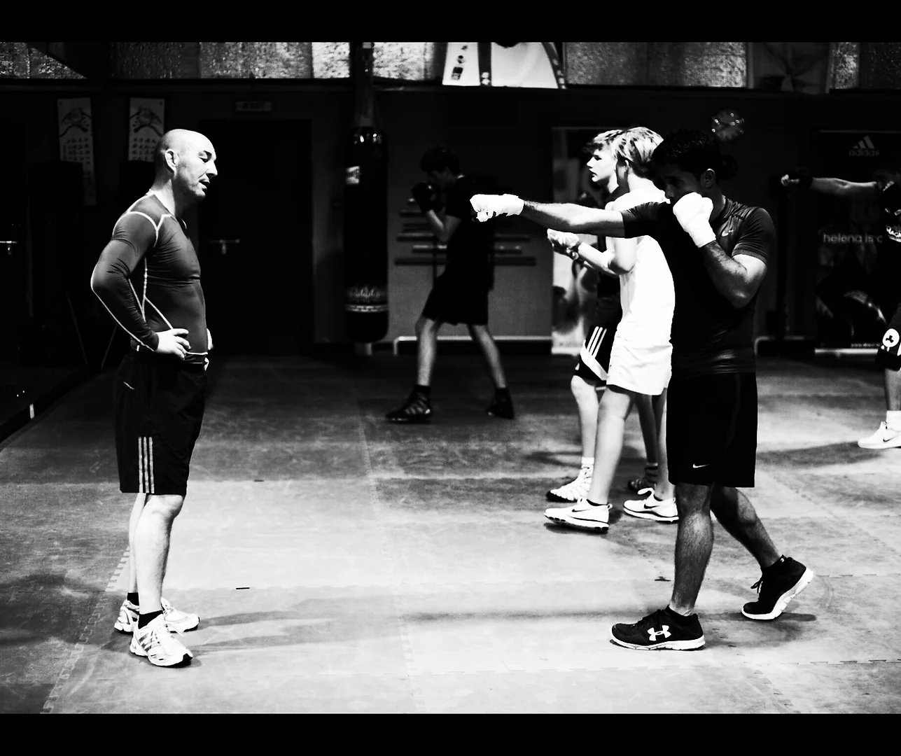 Paul Weir coaches boxers during a group training workshop