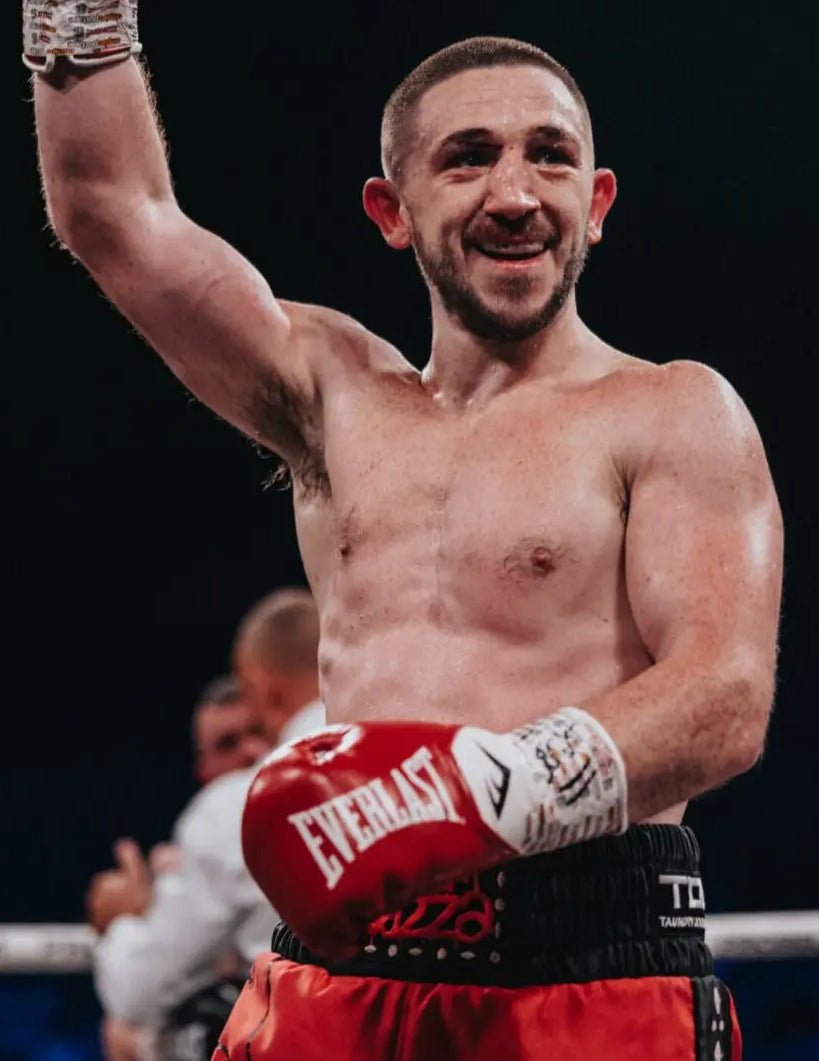 Jazza Dickens celebrating in the ring